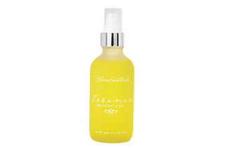 Bottle of Embellish Skin Care Essence Body Oil.